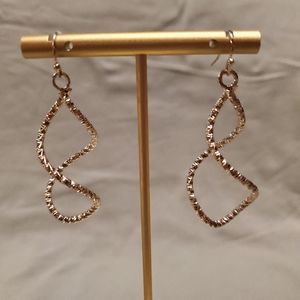 Gold toned twisted textured dangle earrings